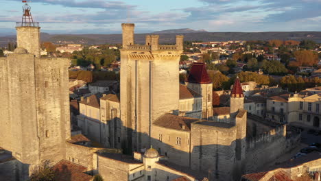 Uzes-Castle-France-aerial-view-during-sunrise-close-view-old-Roman"Castrum"